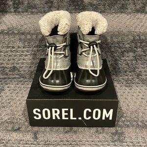 Grey, kids Sorels perfect for the cold.